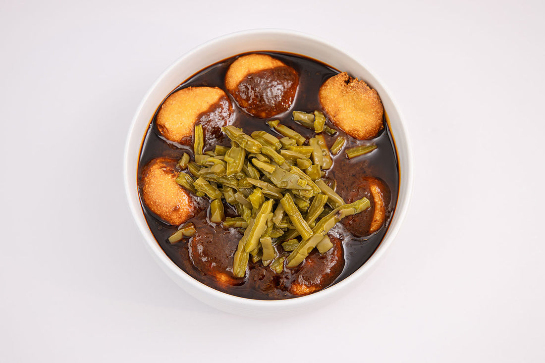 Cheese Balls with Potatoes and Mole Amá Sauce